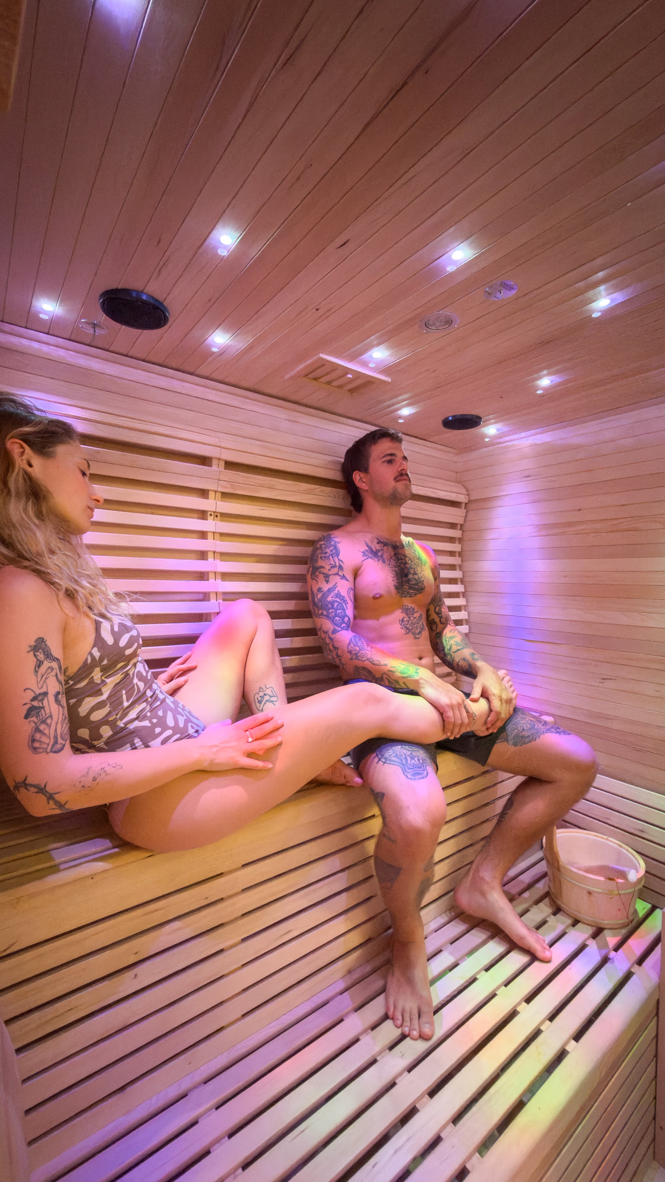 Couple relaxing in the sauna